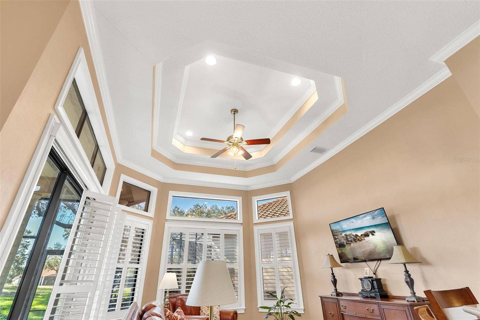 Custom Tray Ceiling enhances this "Romantic" Primary Suite!