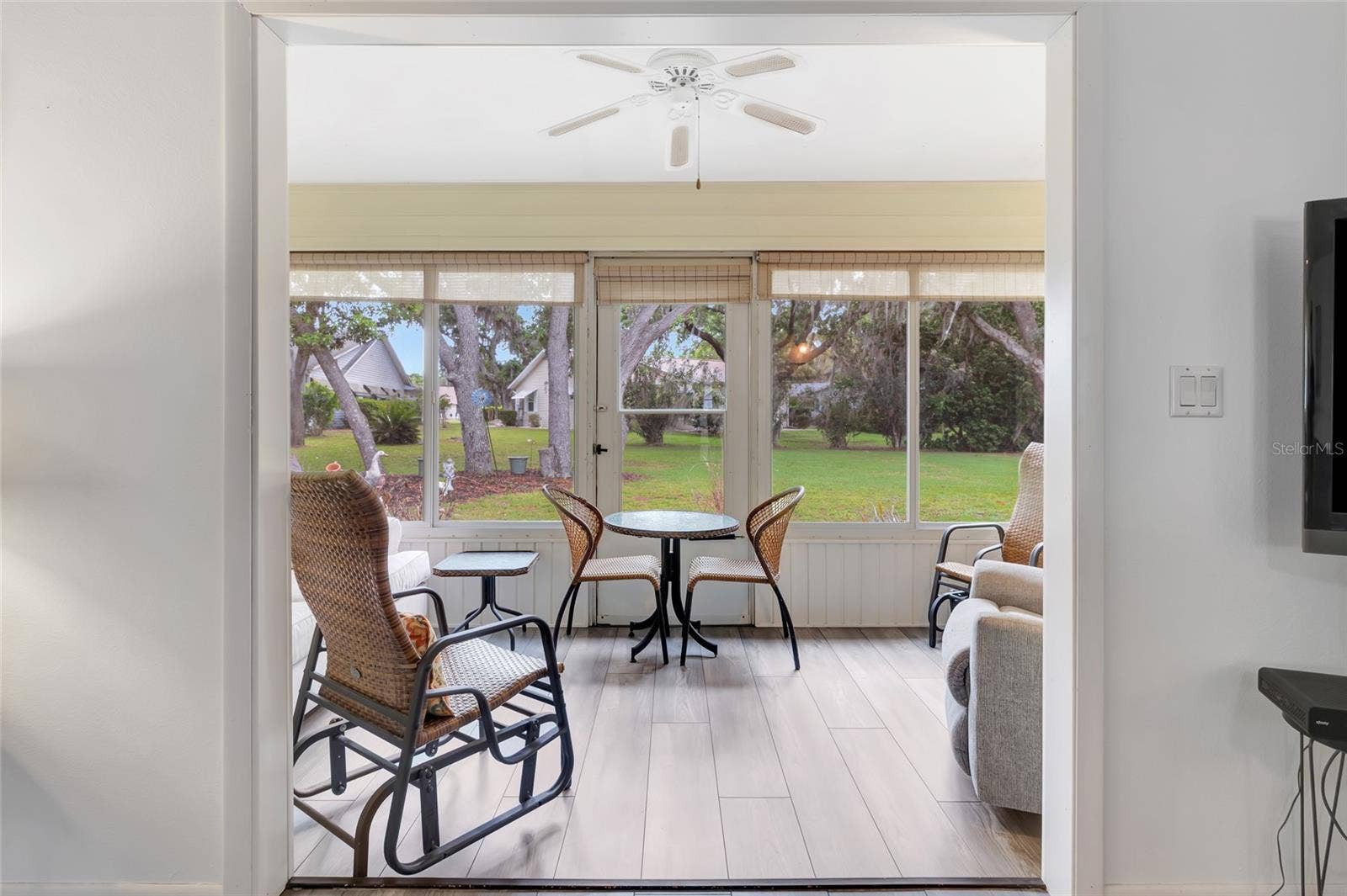 27 GORDON COURT, Leesburg, FL 34788 Glass windows on Florida room for climate control on those warm summer afternoons