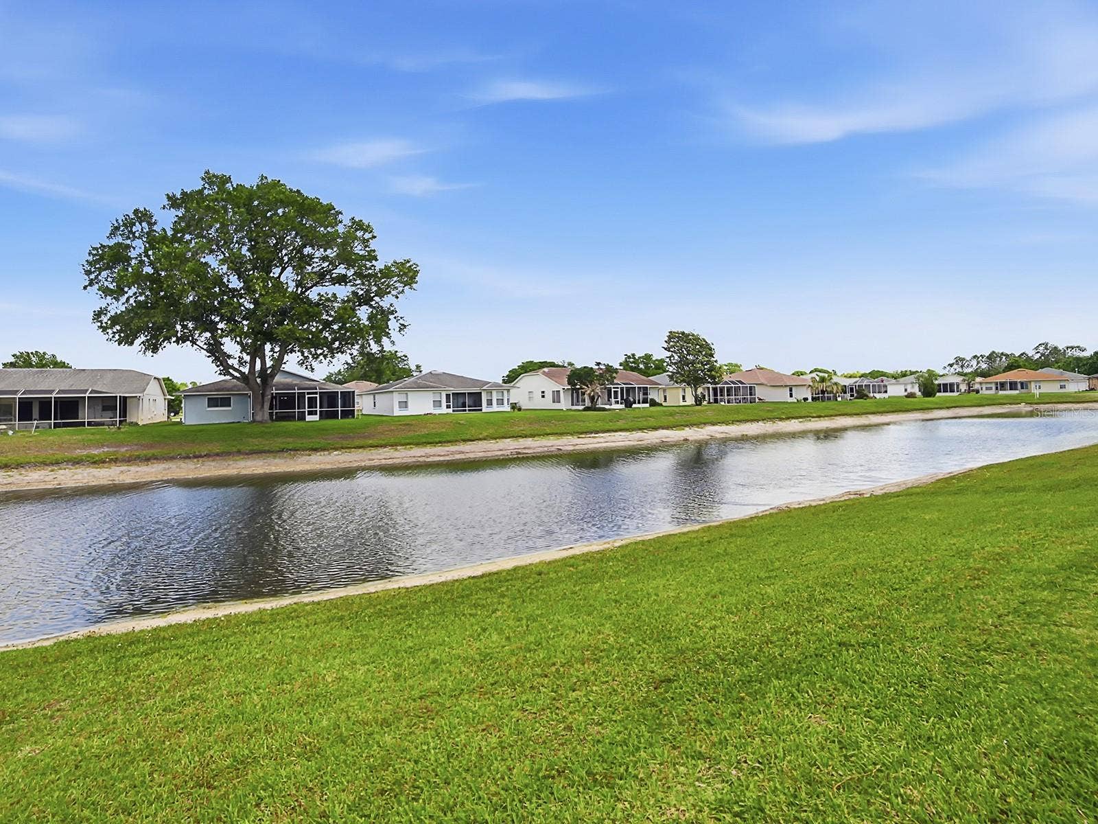 32744 WESTWOOD LOOP, Leesburg, FL 34748 THIS IS YOUR WATER VIEW