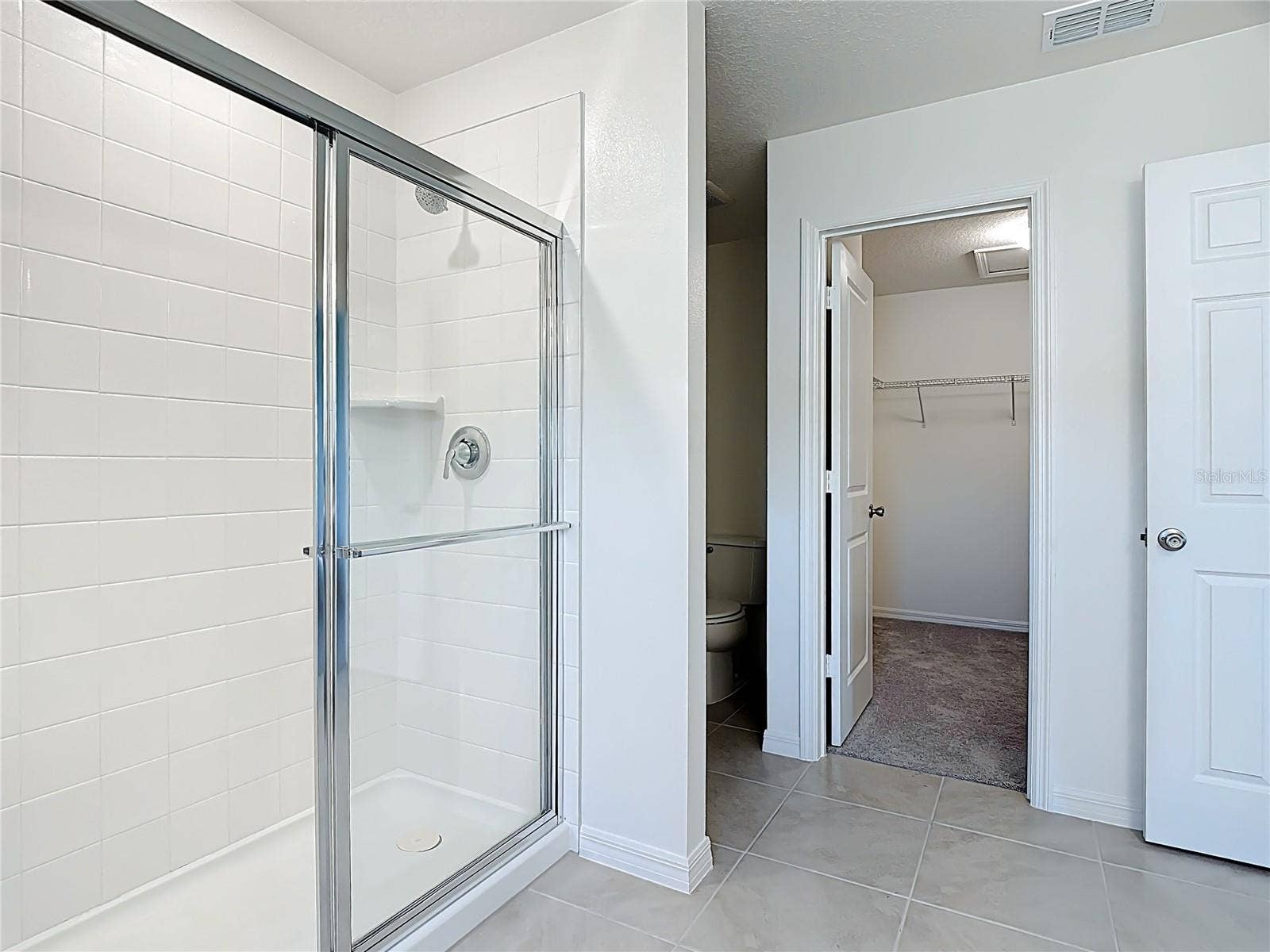 795 OVERPOOL AVENUE, Davenport, FL 33896 Owner's suite with generous walk-in closet