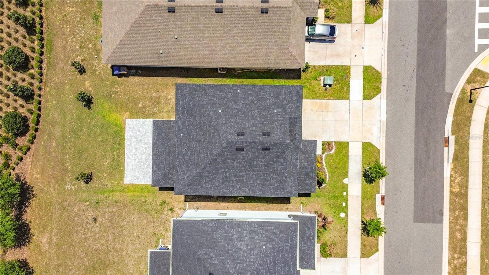 795 OVERPOOL AVENUE, Davenport, FL 33896 Aereal view of roof Built 2023