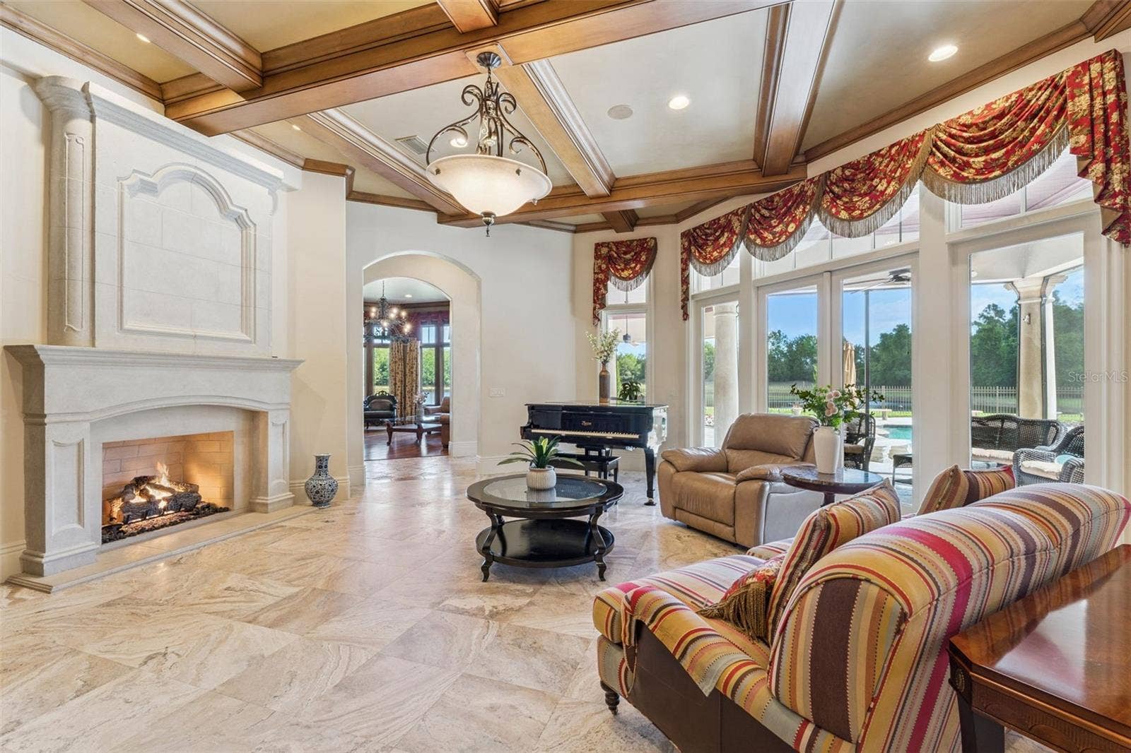 9225 BEVINGTON LANE, Orlando, FL 32827 Family Room with Fireplace