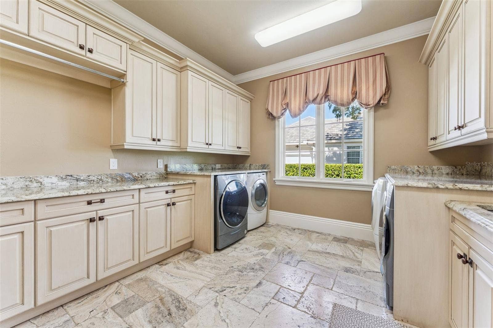 9225 BEVINGTON LANE, Orlando, FL 32827 Laundry Room-2-Washers and 2-Dryers