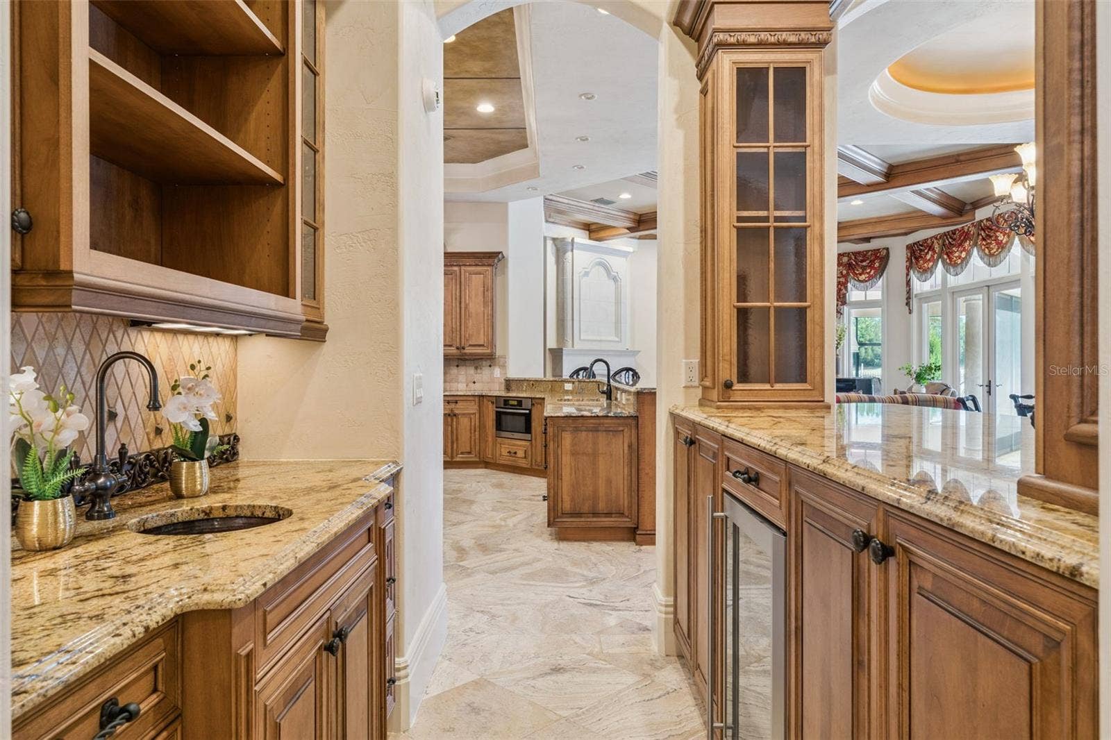 9225 BEVINGTON LANE, Orlando, FL 32827 Bar Area with Walkthrough to Kitchen
