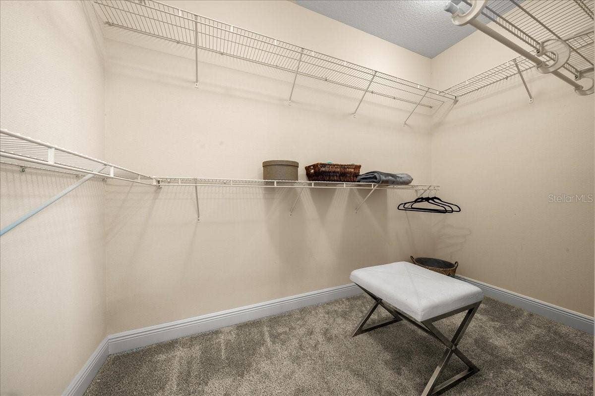 1606 SNELLING AVENUE, The Villages, FL 32162 Primary Bedroom Walk-In Closet