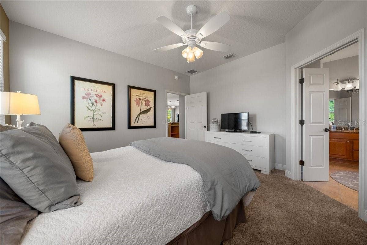 1606 SNELLING AVENUE, The Villages, FL 32162 Primary Bedroom Features Double Doors to Ensuite
