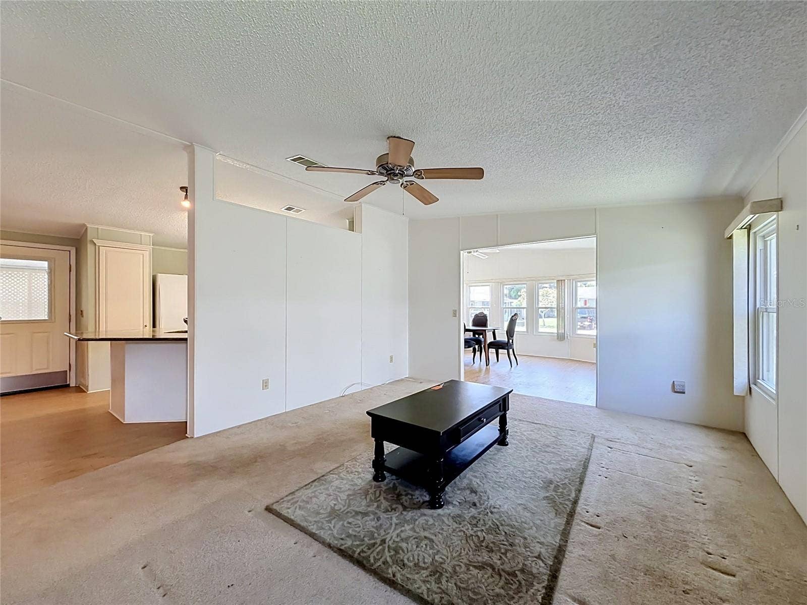 Living Room open to Kitchen and Dining Room