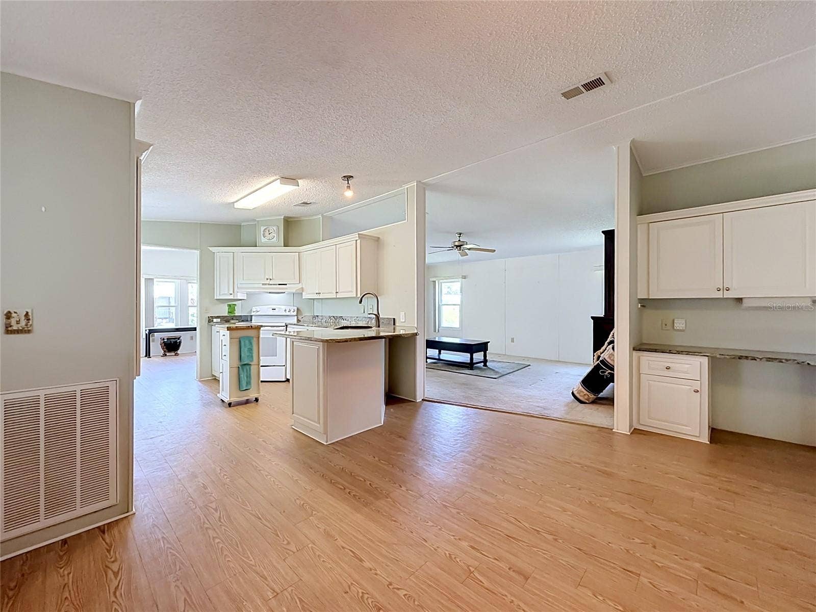 Breakfast nook to Kitchen, Living Room and Desk