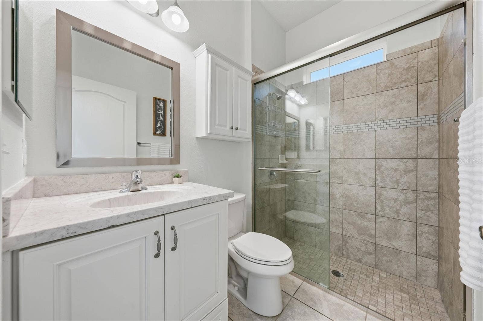 16716 ABBEY HILL COURT, Clermont, FL 34711 Bathroom 3 features tiled walk-in shower