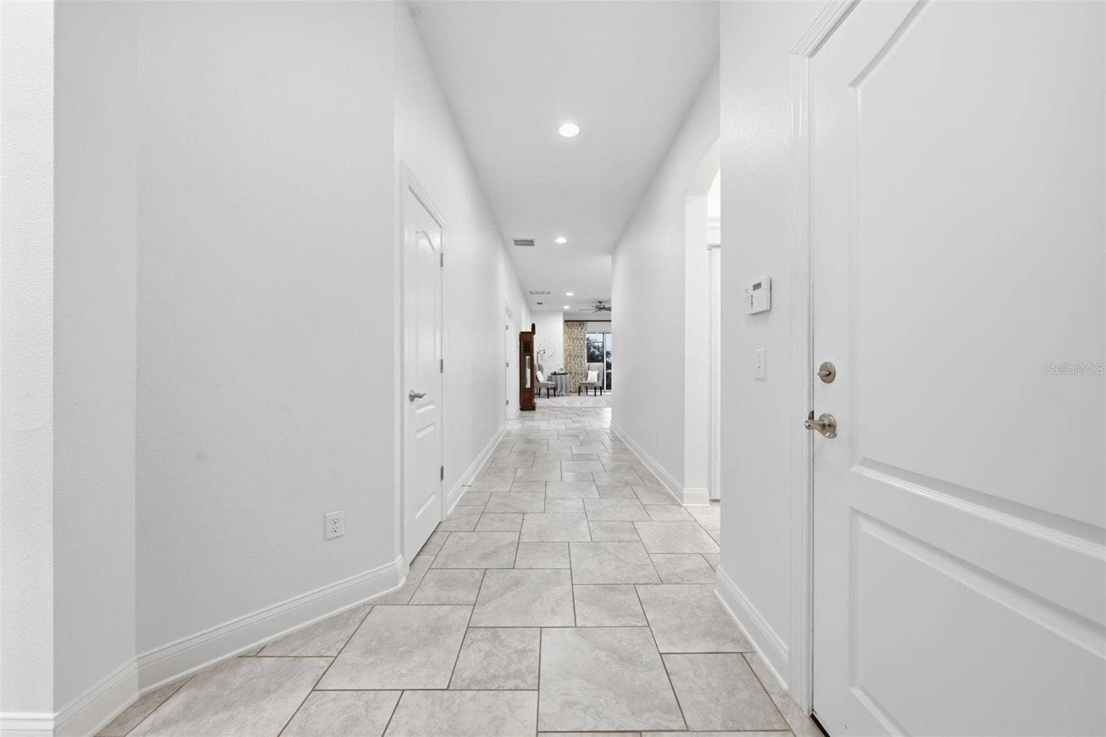 16716 ABBEY HILL COURT, Clermont, FL 34711 Front entry hallway leading into main area