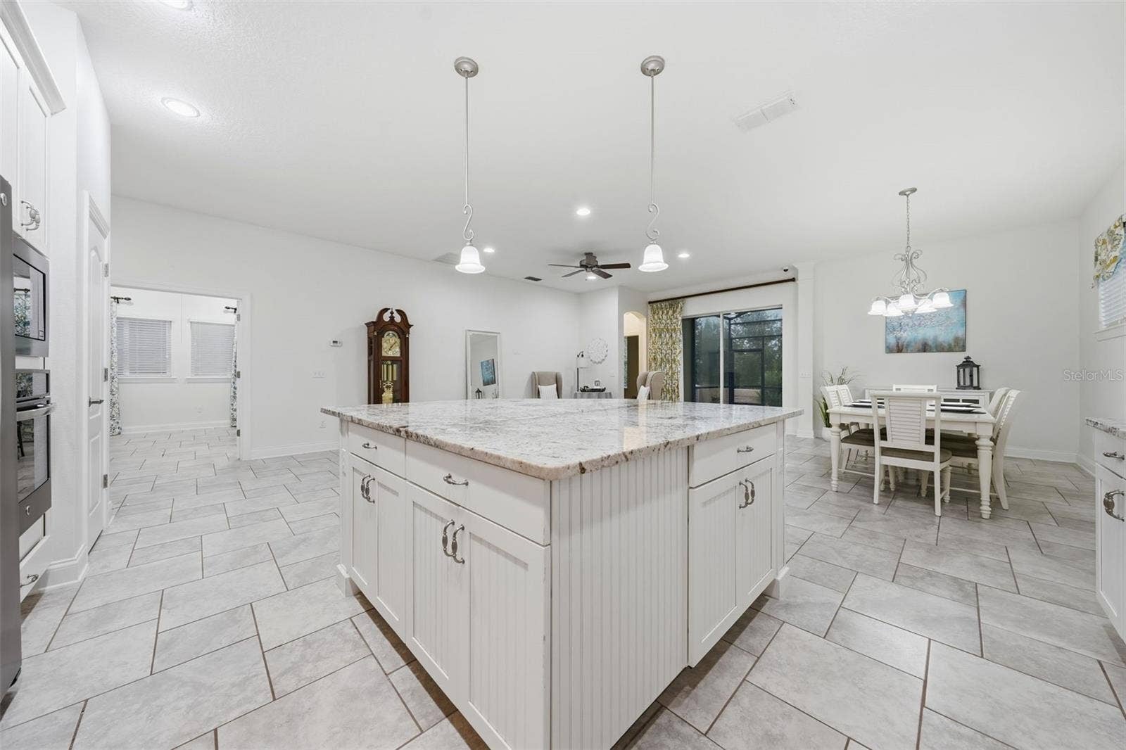 16716 ABBEY HILL COURT, Clermont, FL 34711 Kitchen offers large Kitchen island