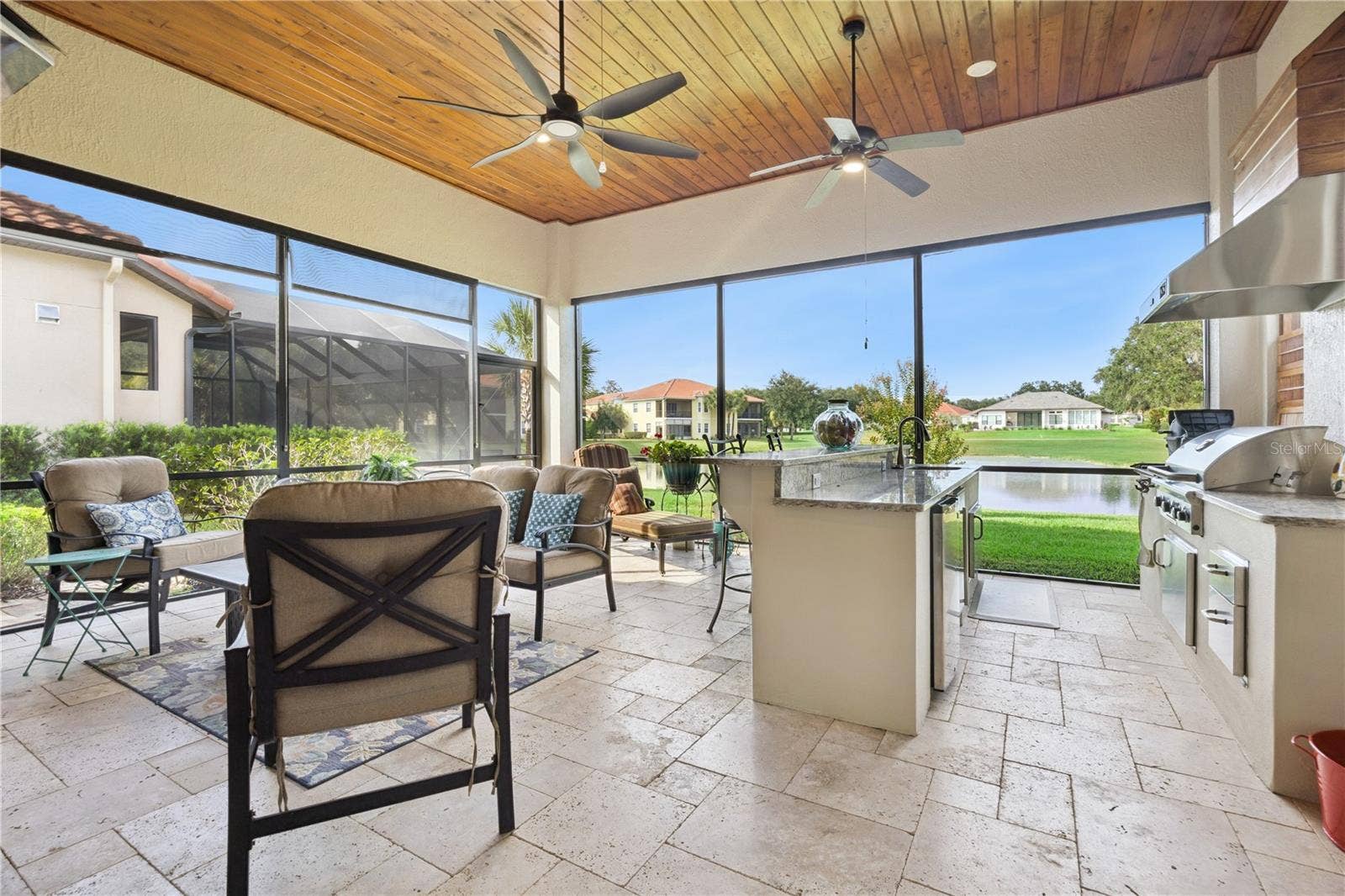 9219 SAN JOSE BOULEVARD, Howey In The Hills, FL 34737 Extended living & entertainment space.