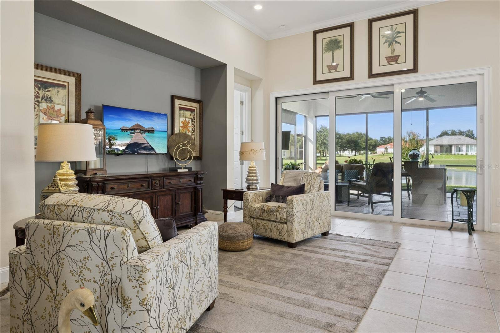 9219 SAN JOSE BOULEVARD, Howey In The Hills, FL 34737 Open living room with sliding doors to Summer Kitchen