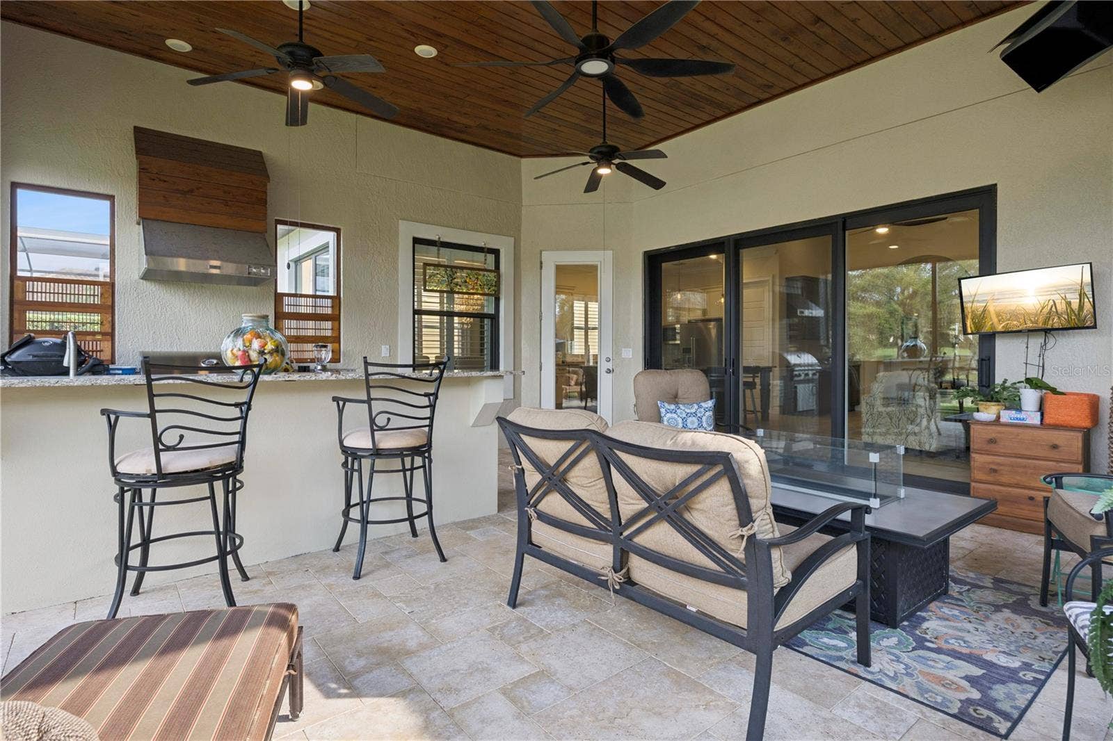 9219 SAN JOSE BOULEVARD, Howey In The Hills, FL 34737 Inviting Summer Kitchen with gas grill.
