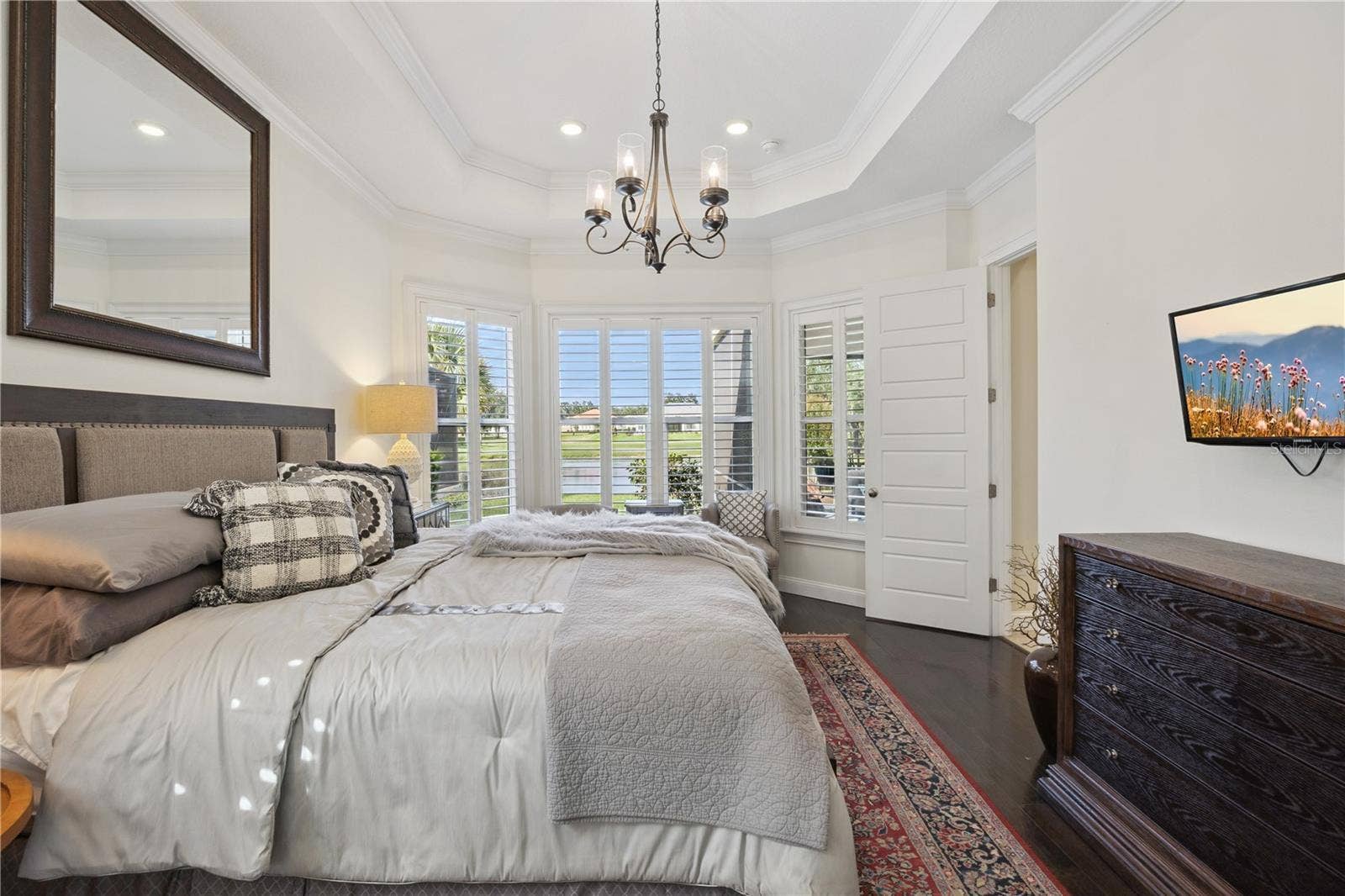 9219 SAN JOSE BOULEVARD, Howey In The Hills, FL 34737 Stunning Master bedroom with views of the pond.