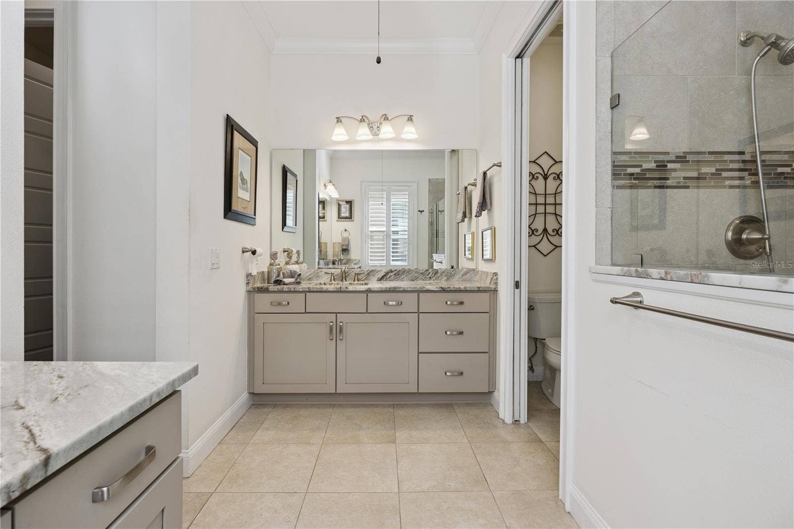 9219 SAN JOSE BOULEVARD, Howey In The Hills, FL 34737 Stunning Master Bath with His & Her vanities plus Shower.