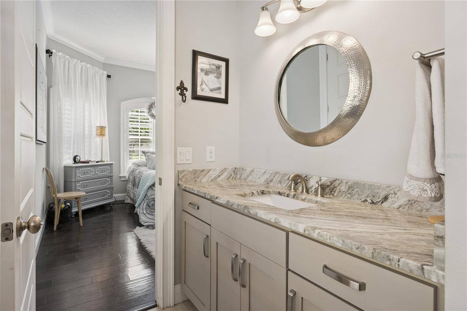 9219 SAN JOSE BOULEVARD, Howey In The Hills, FL 34737 Guest Bath granite vanity.