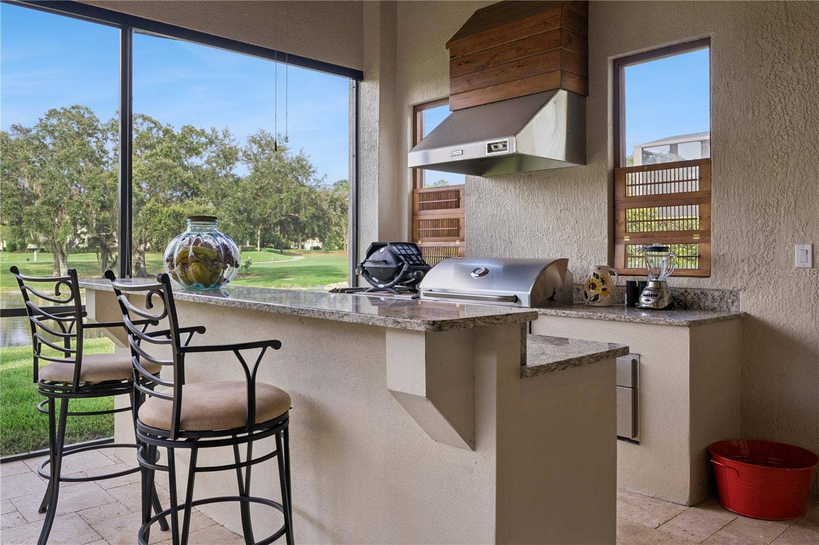 9219 SAN JOSE BOULEVARD, Howey In The Hills, FL 34737 Lovely outdoor entertainment Summer Kitchen.