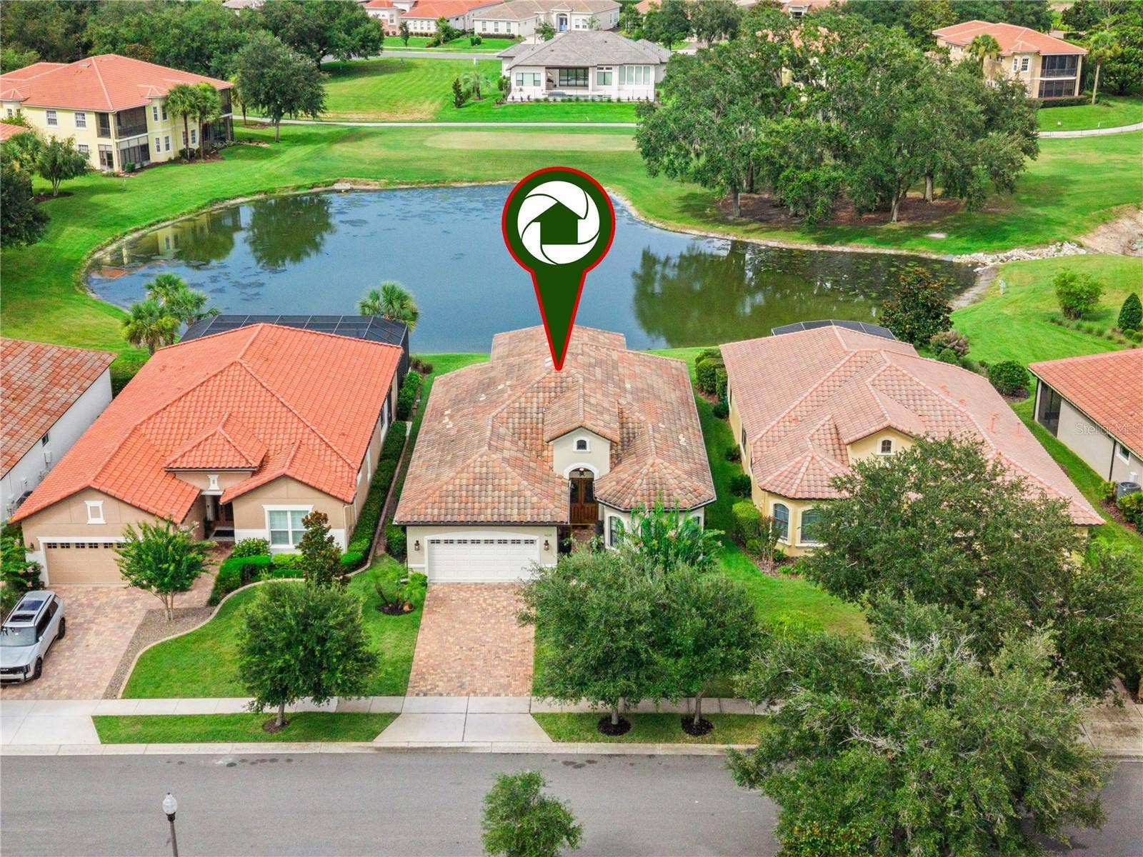9219 SAN JOSE BOULEVARD, Howey In The Hills, FL 34737 Amazing pond & golf course view.