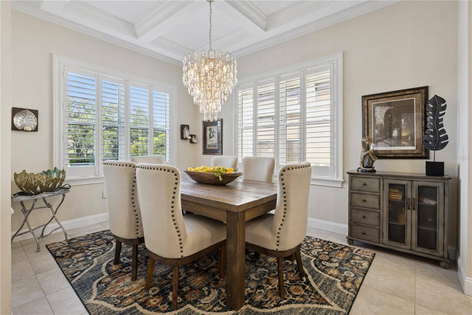 9219 SAN JOSE BOULEVARD, Howey In The Hills, FL 34737 Stunning Dining room with designer light fixture and tray ceiling.