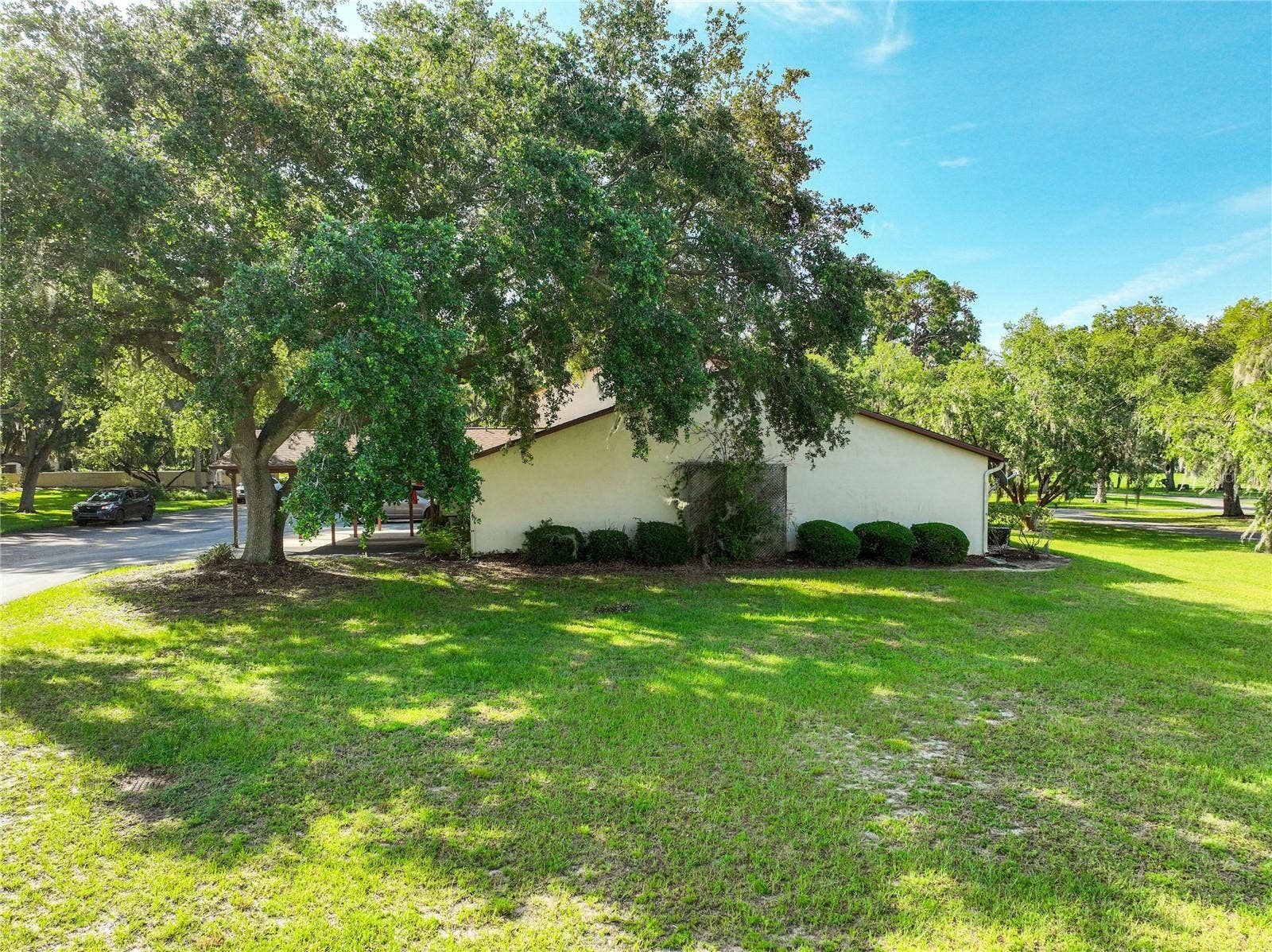 4300 BAYWOOD BOULEVARD, #C106, Mount Dora, FL 32757 End Unit C-106
