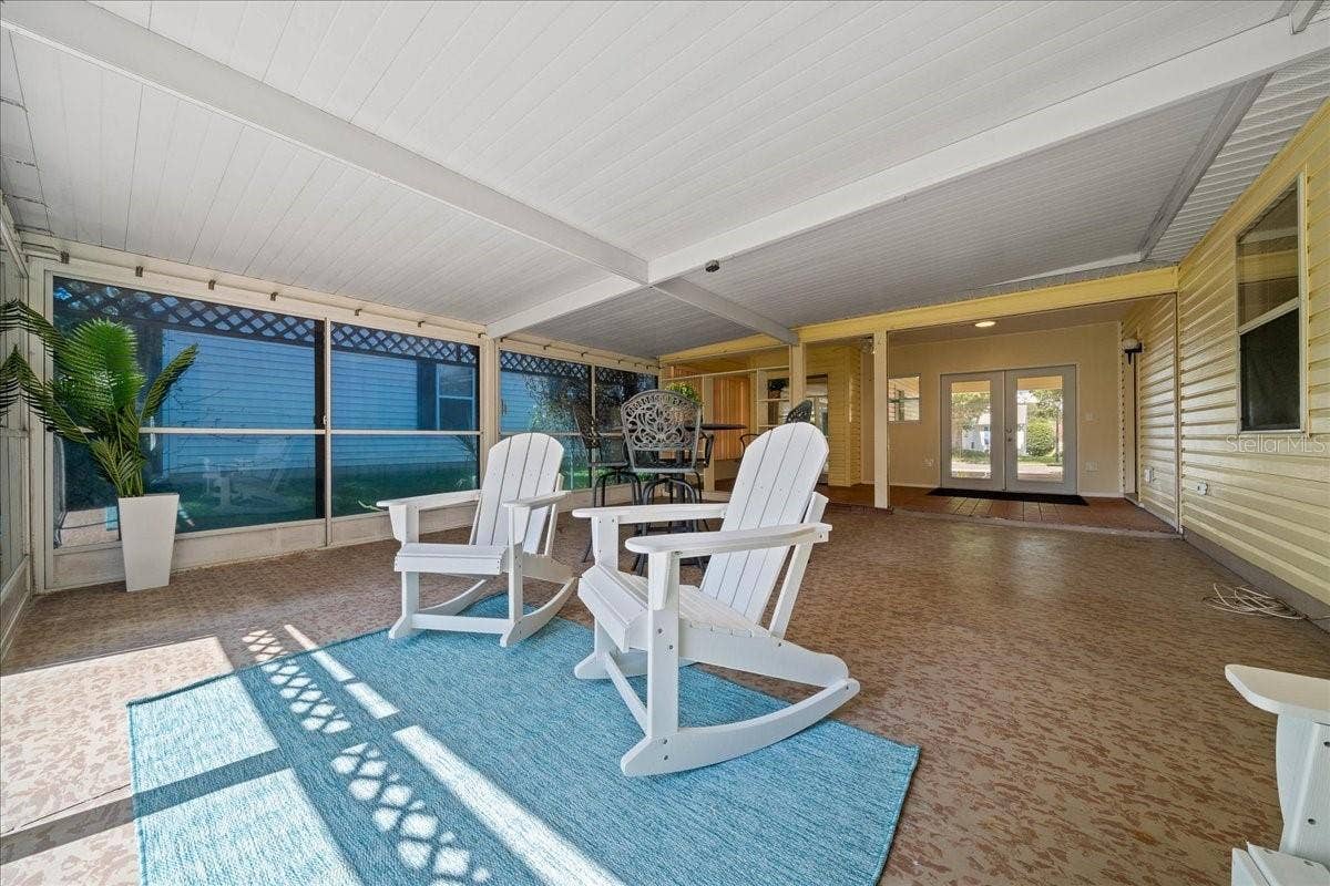 1133 DEL TORO DRIVE, Lady Lake, FL 32159 Lanai Front Row Seating to Watch the Golfers