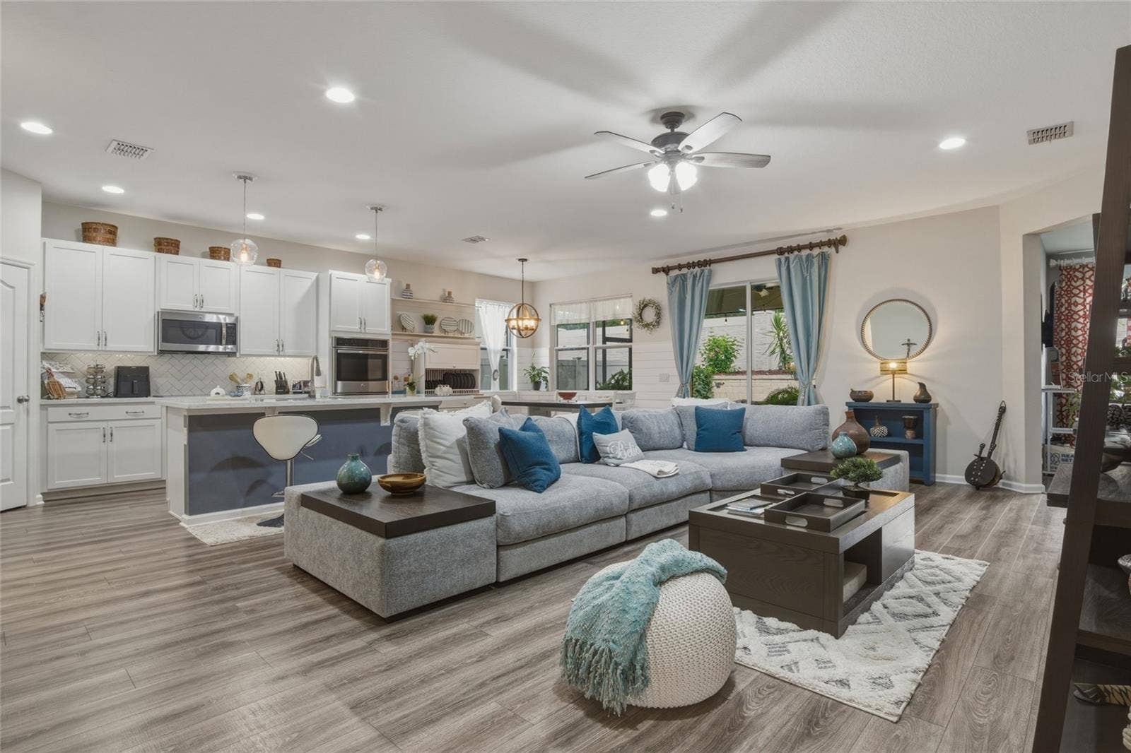 16742 ABBEY HILL COURT, Clermont, FL 34711 Living Room & Kitchen