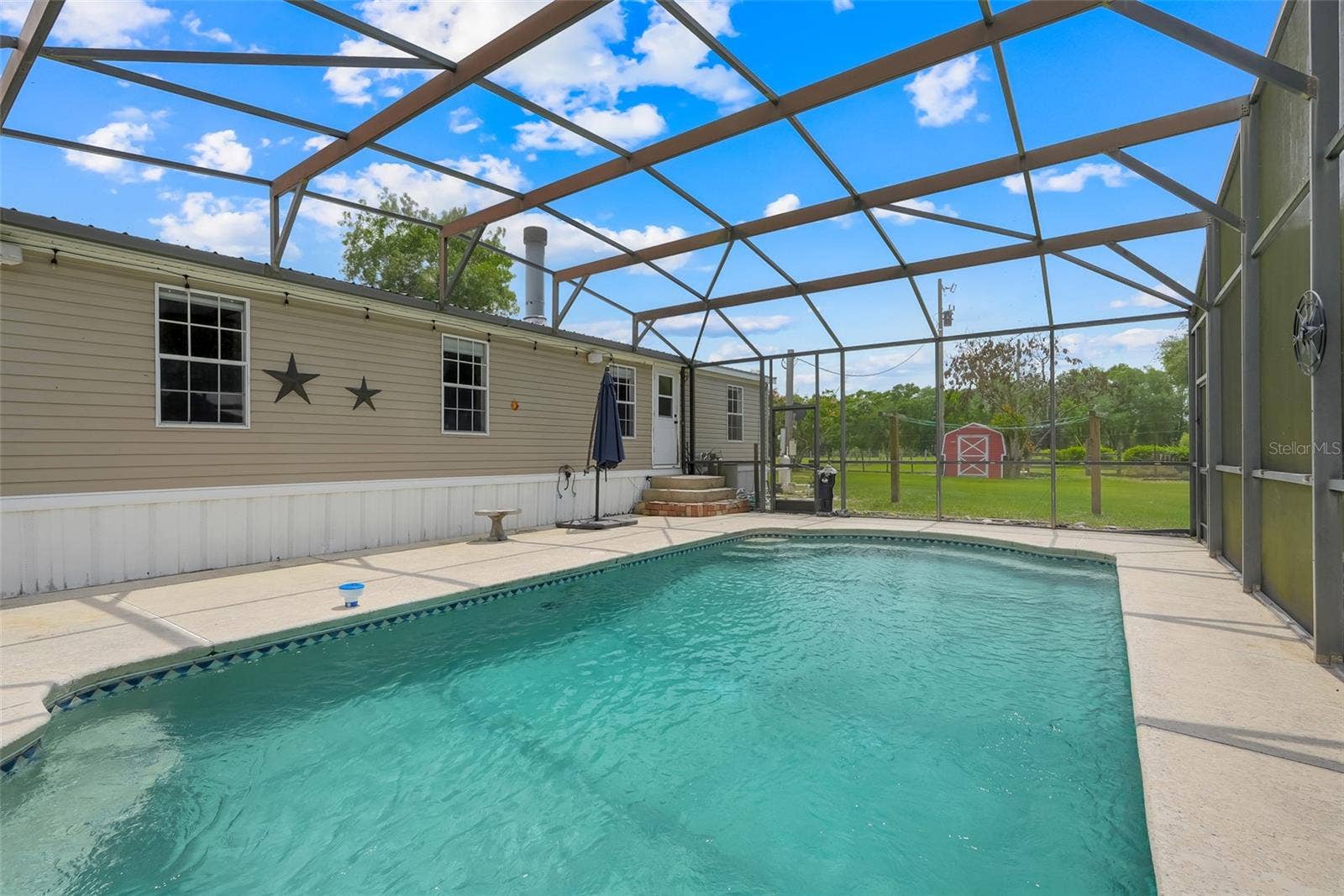 21301 QUAIL HAMMOCK LANE, Groveland, FL 34736 Pool attached to the mobile home