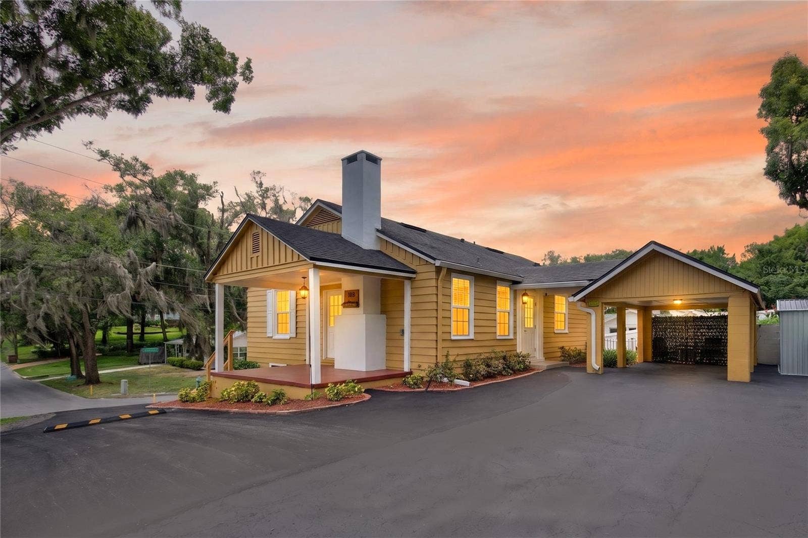 102 N CLAYTON STREET, Mount Dora, FL 32757 Twilight Main Entrance