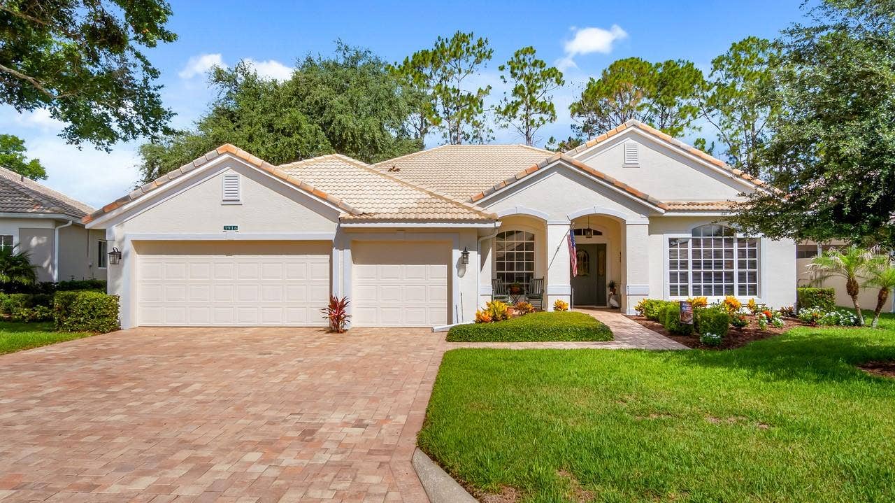 3916 PAYTON COURT, Clermont, FL 34711 Front with Paver Driveway and Walkway