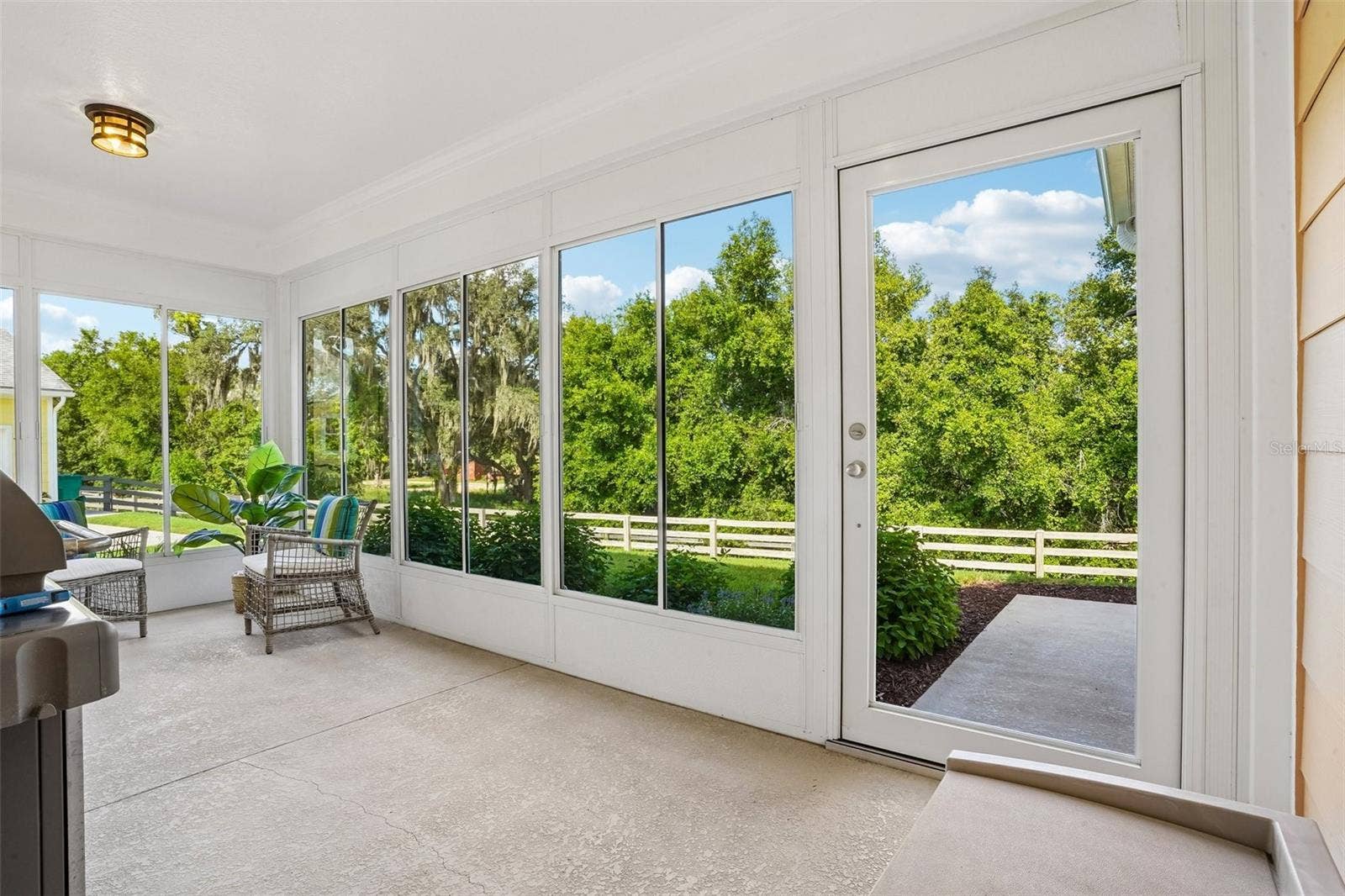1212 FIESTA KEY CIRCLE, Lady Lake, FL 32159 Enclosed Lanai