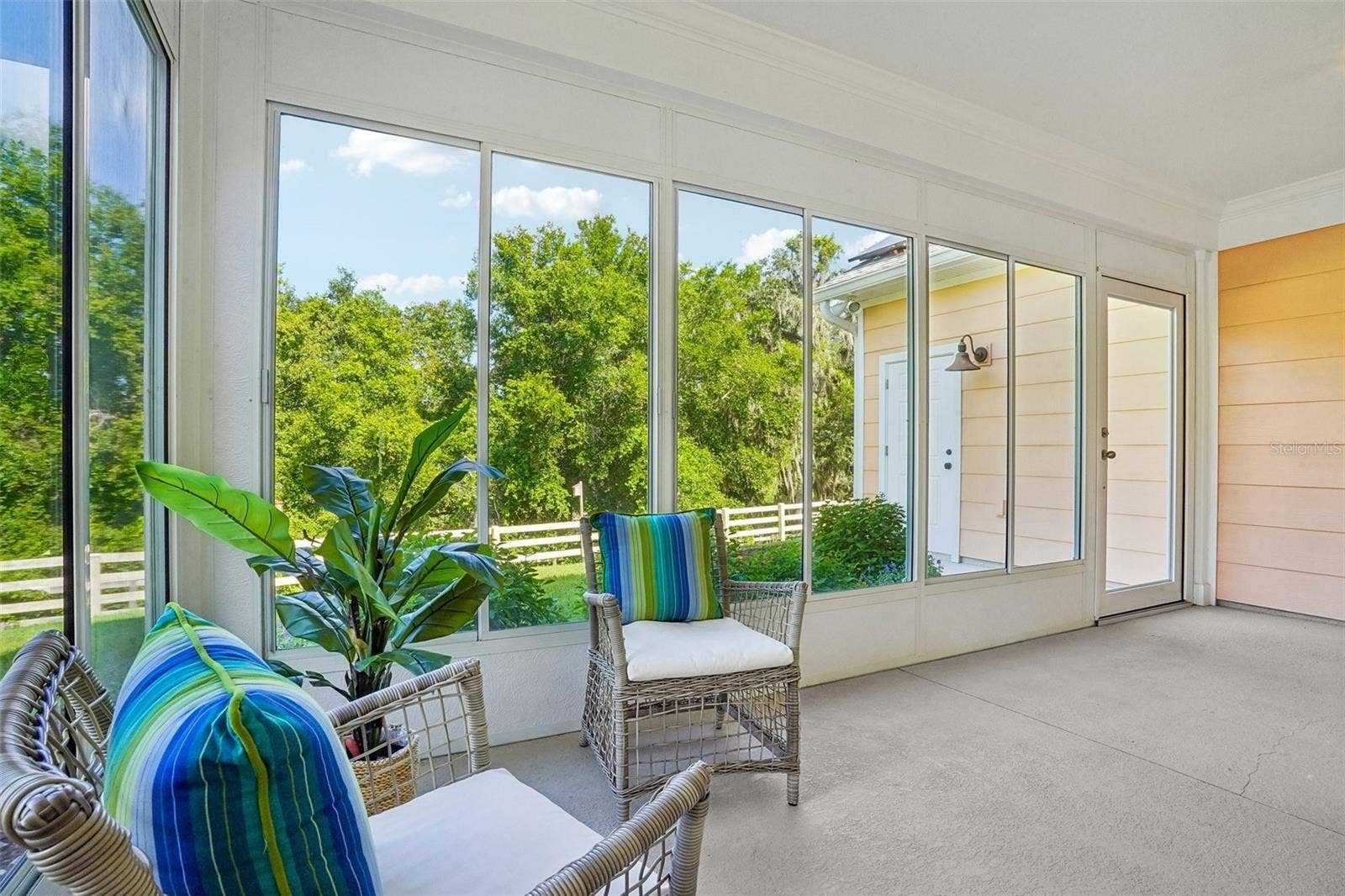 1212 FIESTA KEY CIRCLE, Lady Lake, FL 32159 Enclosed Lanai