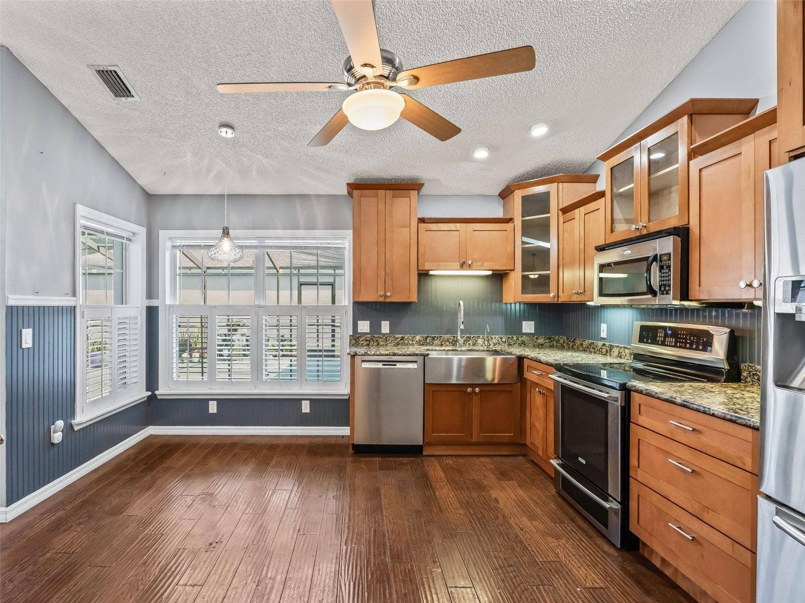 Kitchen w/Stainless Appliances & Plantation shutters