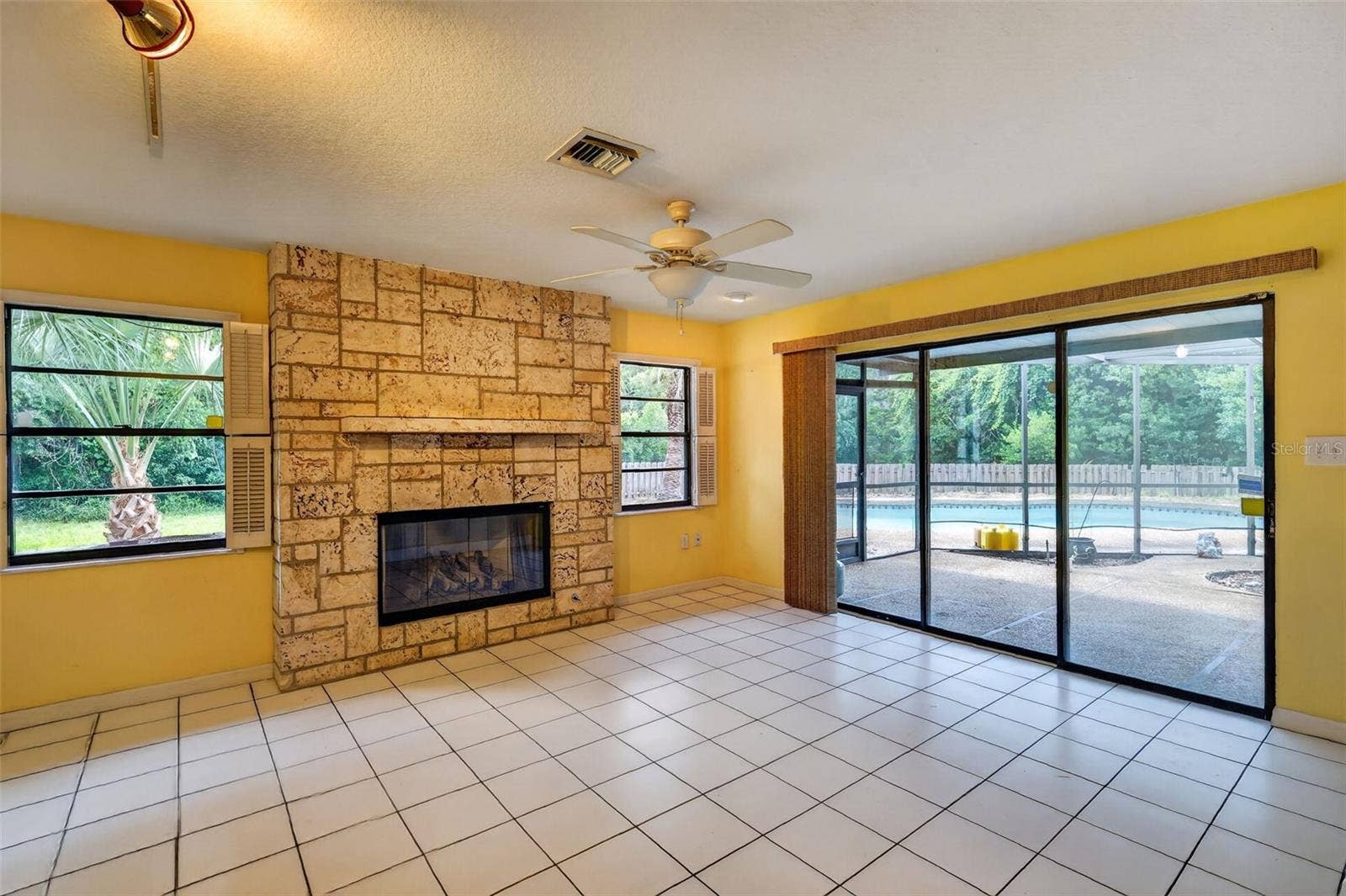 2085 SUSSEX DRIVE, Mount Dora, FL 32757 Family Room w/ Gas Fireplace