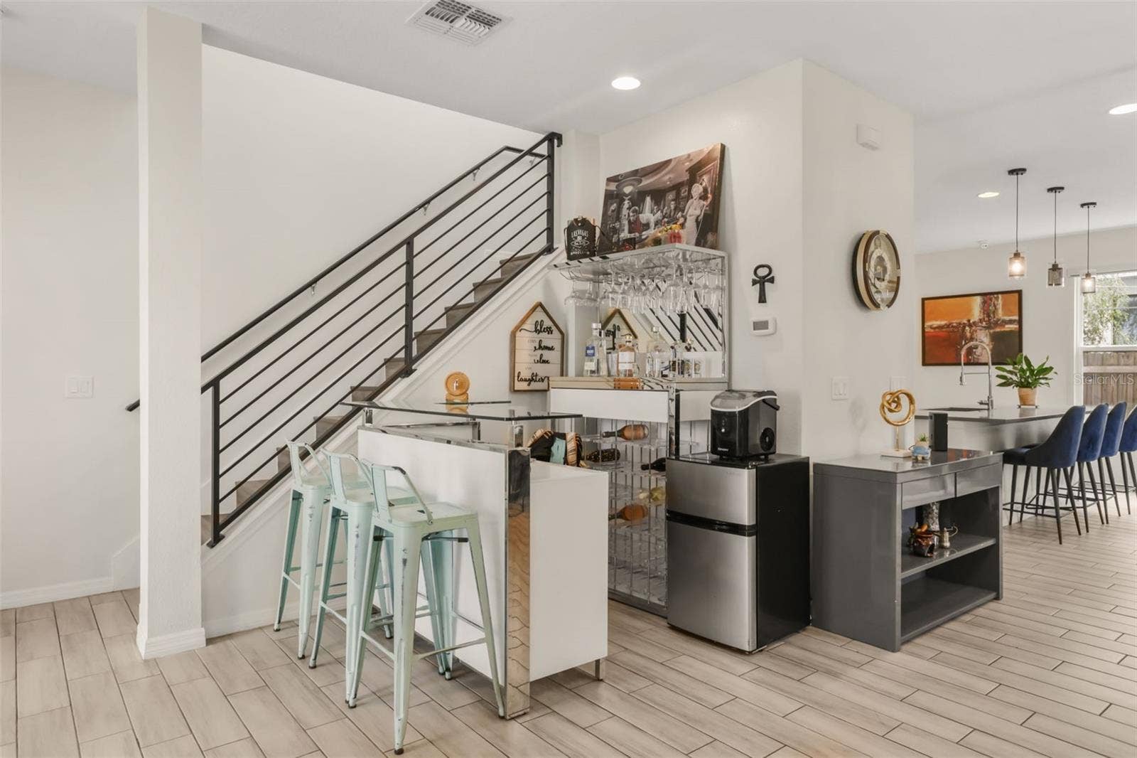 Stairs leading to the second story, where all bedrooms are located