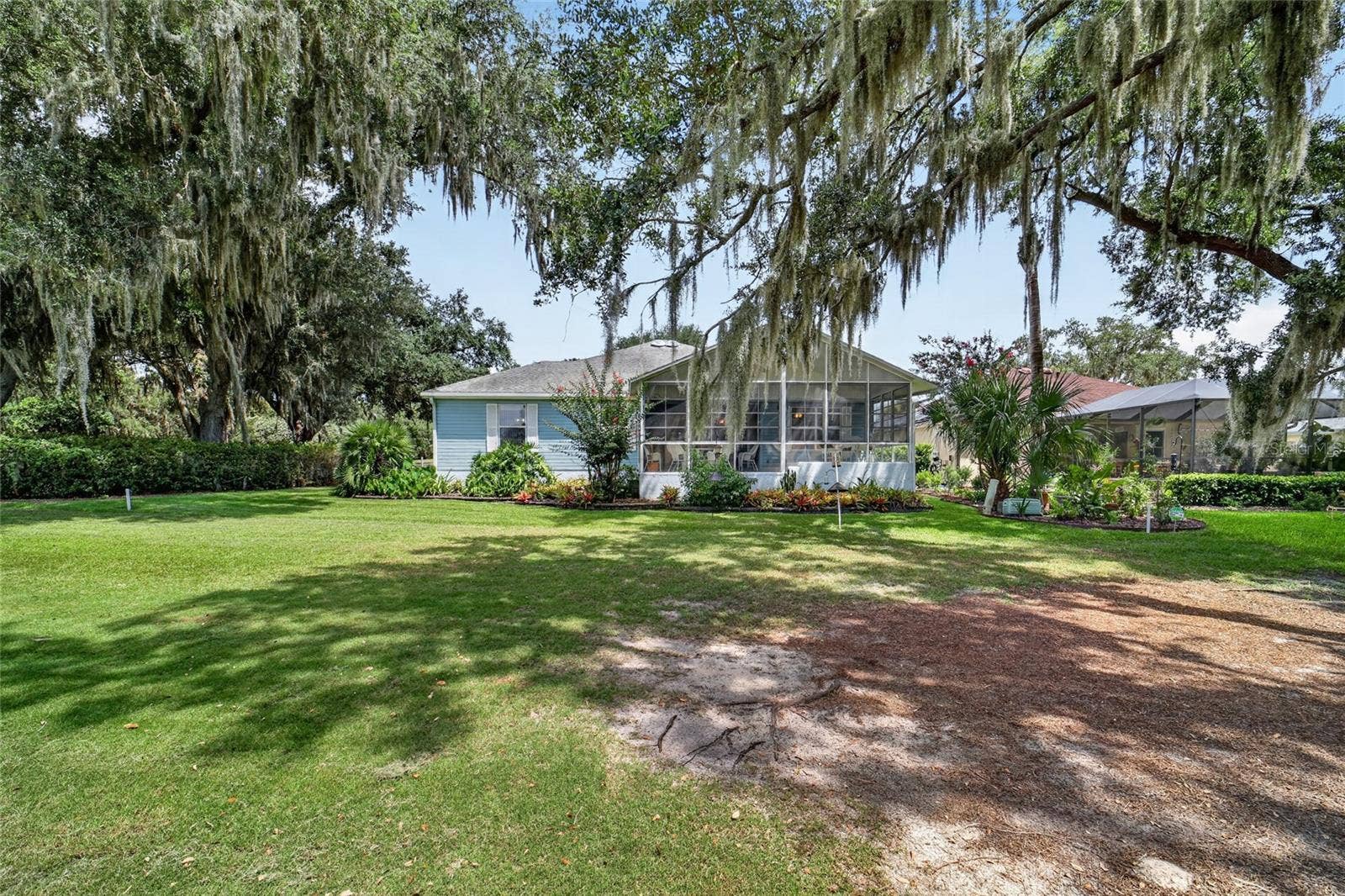 1230 DESILVA STREET, The Villages, FL 32159 Back of House from Golf Course