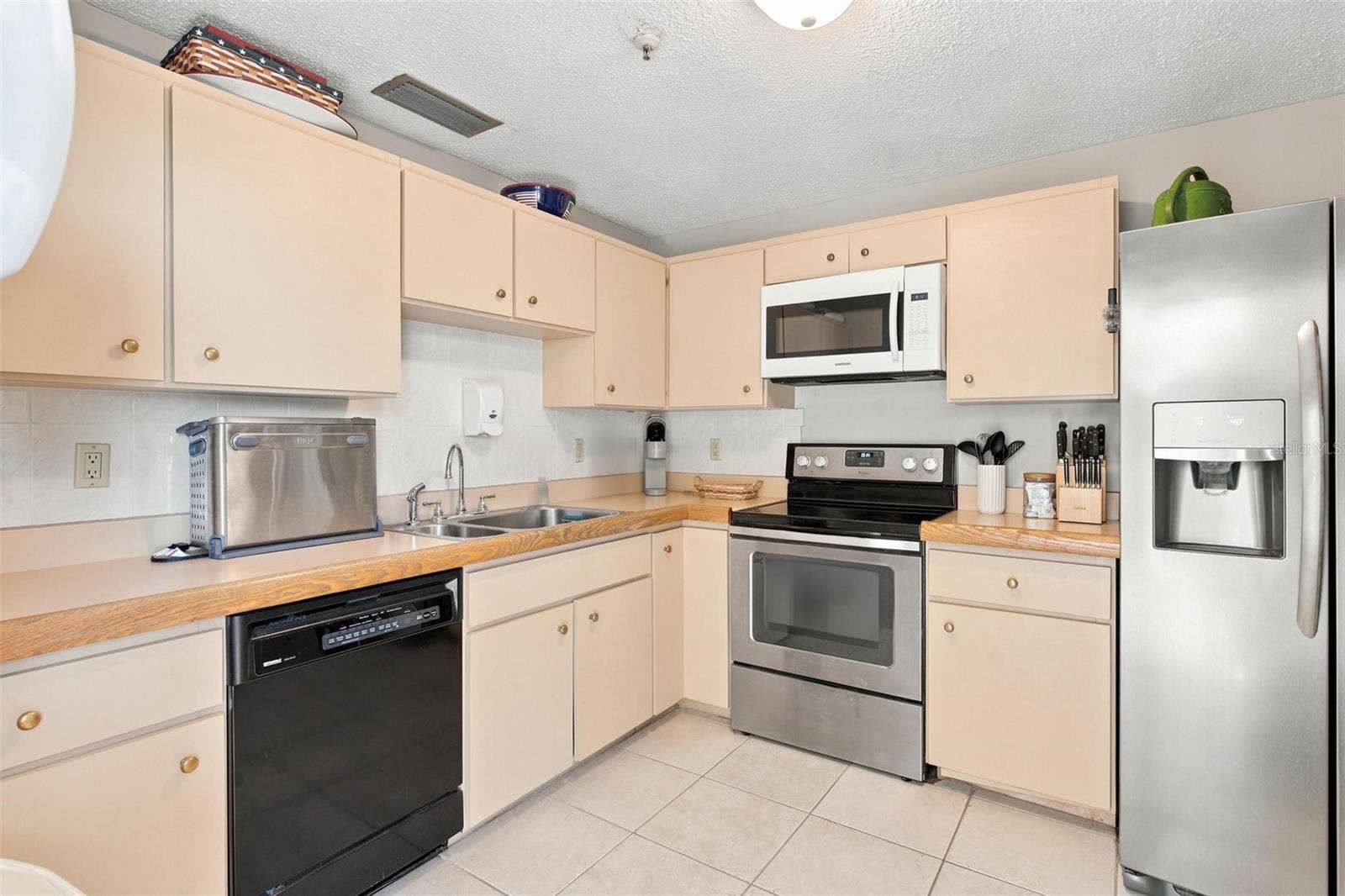 395 S ATLANTIC AVENUE, #402, Ormond Beach, FL 32176 Kitchen in recreation room.