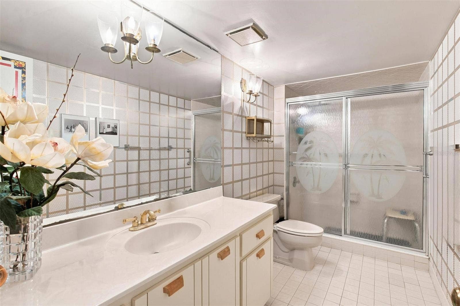 395 S ATLANTIC AVENUE, #402, Ormond Beach, FL 32176 Guest Bathroom features walk in shower.