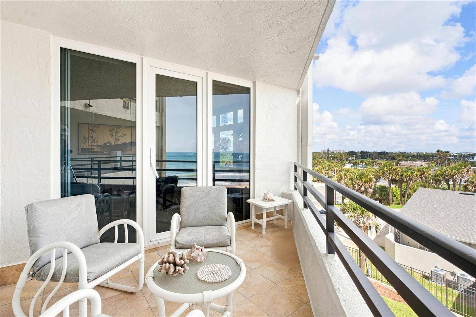 395 S ATLANTIC AVENUE, #402, Ormond Beach, FL 32176 Balcony with access from both Living Room and Guest Bedroom