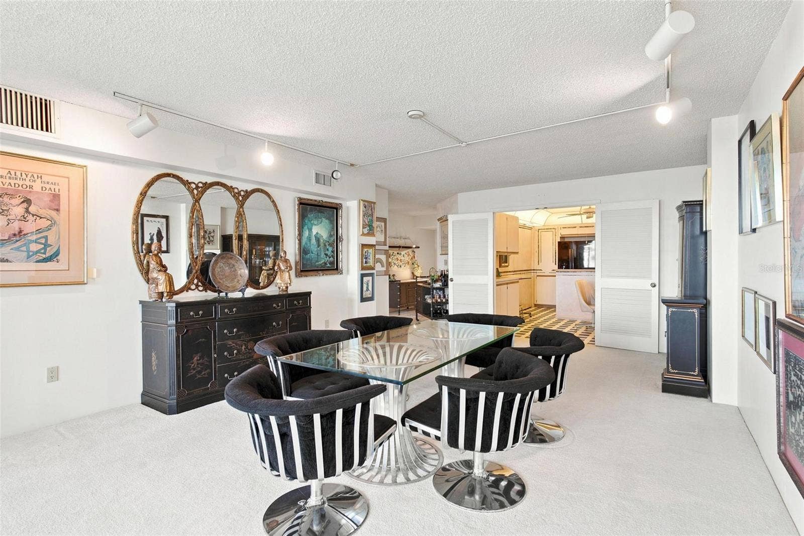 395 S ATLANTIC AVENUE, #402, Ormond Beach, FL 32176 Open Living Space. Dining and Living Area overlook Kitchen and has sliders leading to balcony with ocean view.