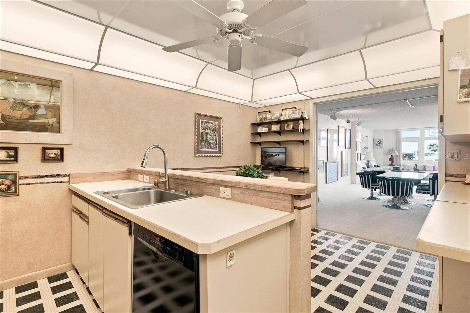 395 S ATLANTIC AVENUE, #402, Ormond Beach, FL 32176 Kitchen features a dinette area and overlooks the dining and living area.