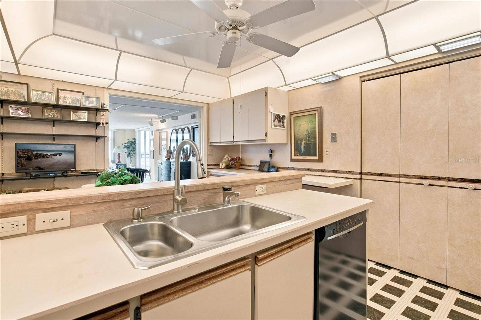 395 S ATLANTIC AVENUE, #402, Ormond Beach, FL 32176 Kitchen features a dinette area and overlooks the dining and living area.