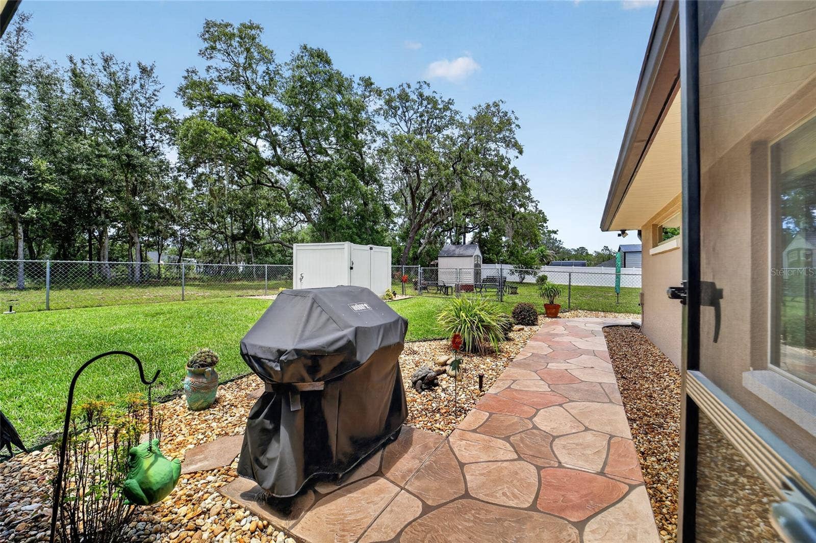 16364 SE 89TH TERRACE, Summerfield, FL 34491 Back Yard just outside lanai screened door