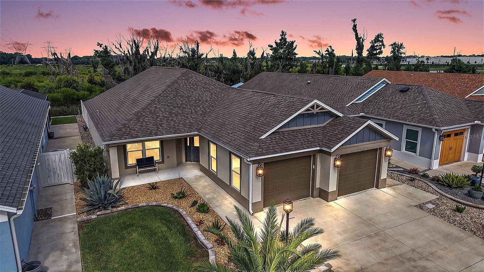 4686 HILES PLACE, The Villages, FL 32163 Twilight Front Elevation