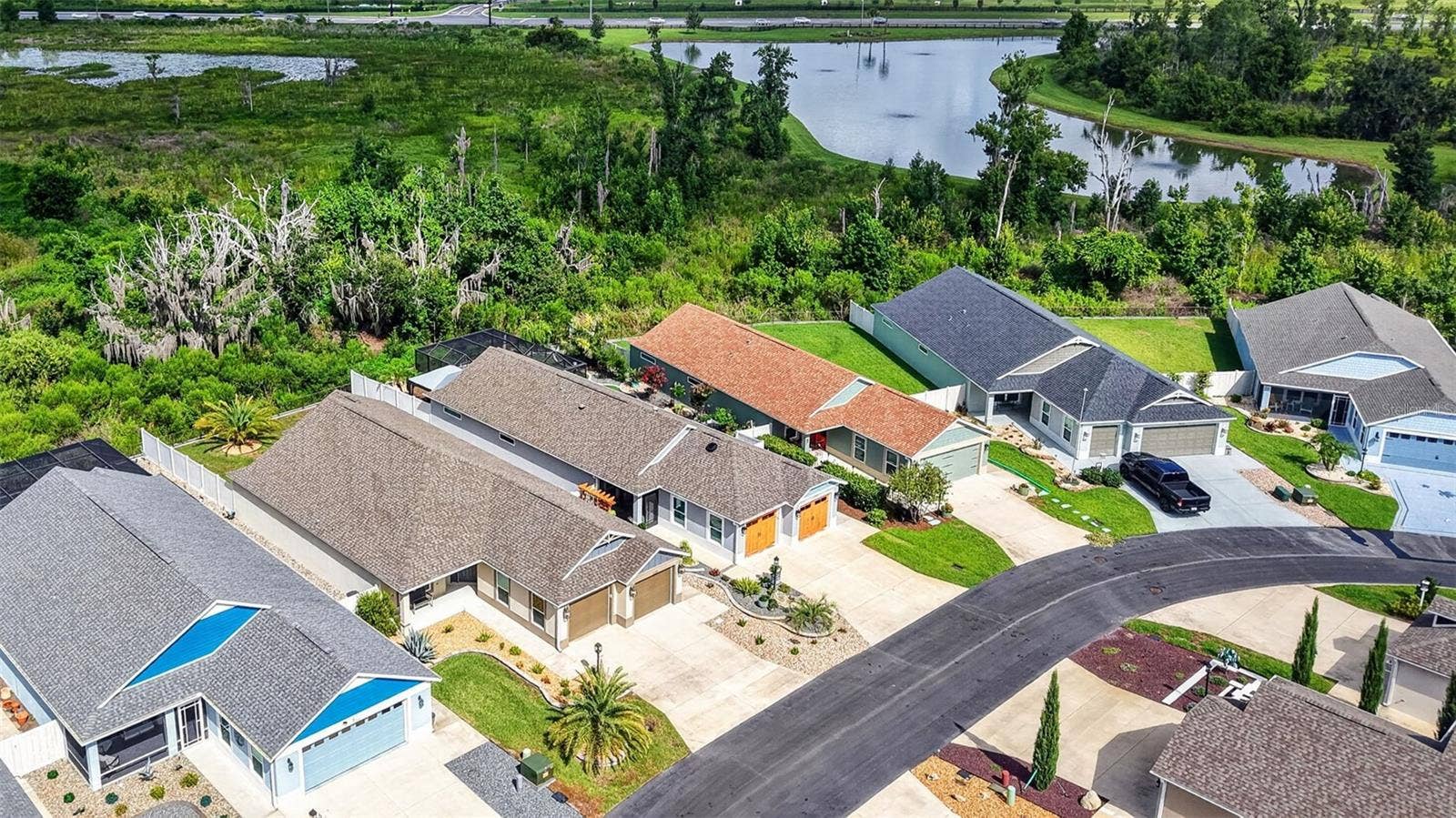 4686 HILES PLACE, The Villages, FL 32163 Aerial Front Elevation with Preserve and Water Views!