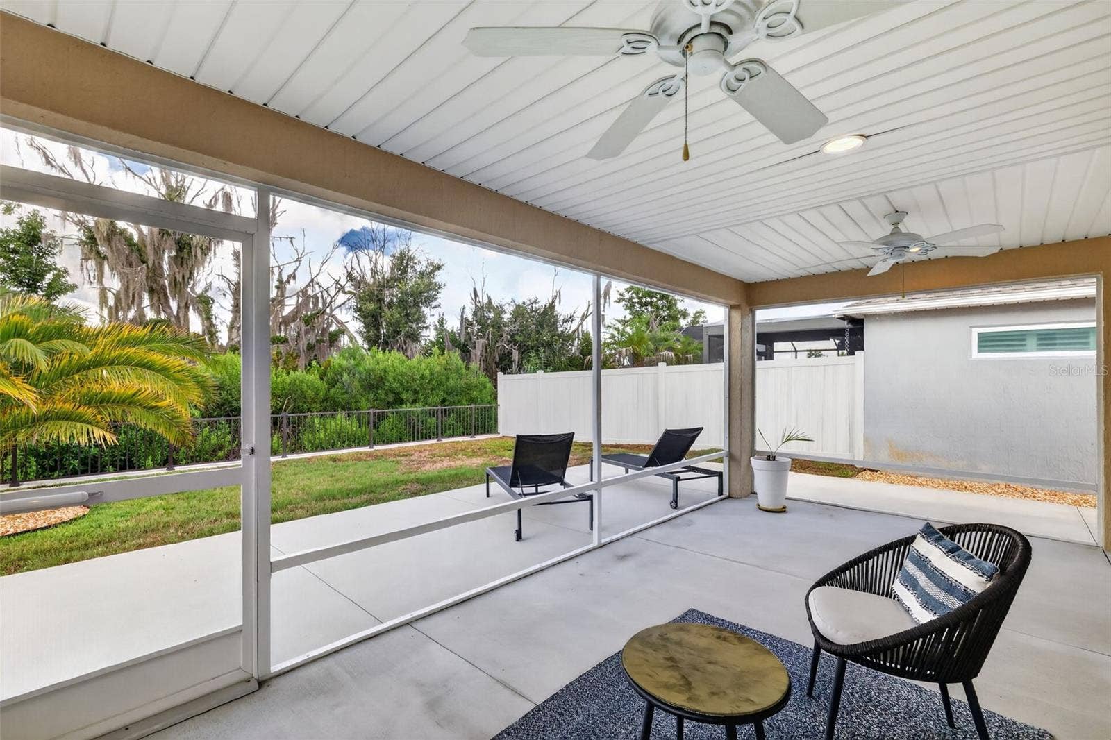 4686 HILES PLACE, The Villages, FL 32163 Lanai and Rear Patio with PRIVATE Serene Preserve Views!