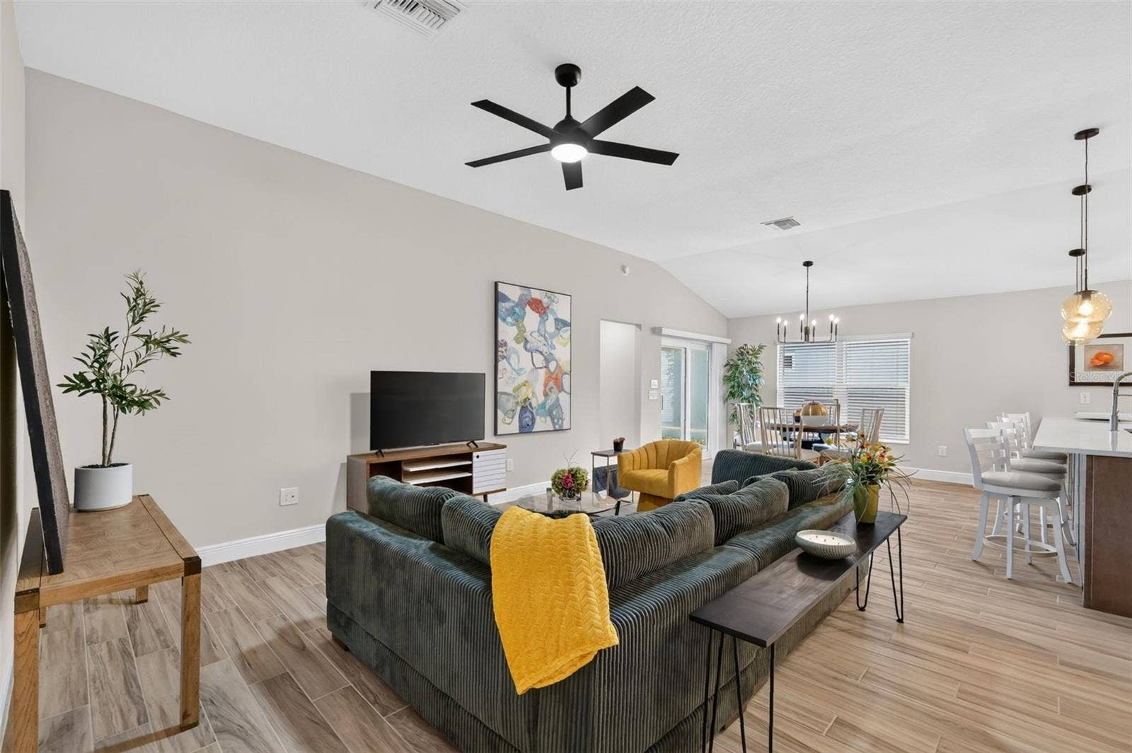 4686 HILES PLACE, The Villages, FL 32163 Living, Dining, and Kitchen