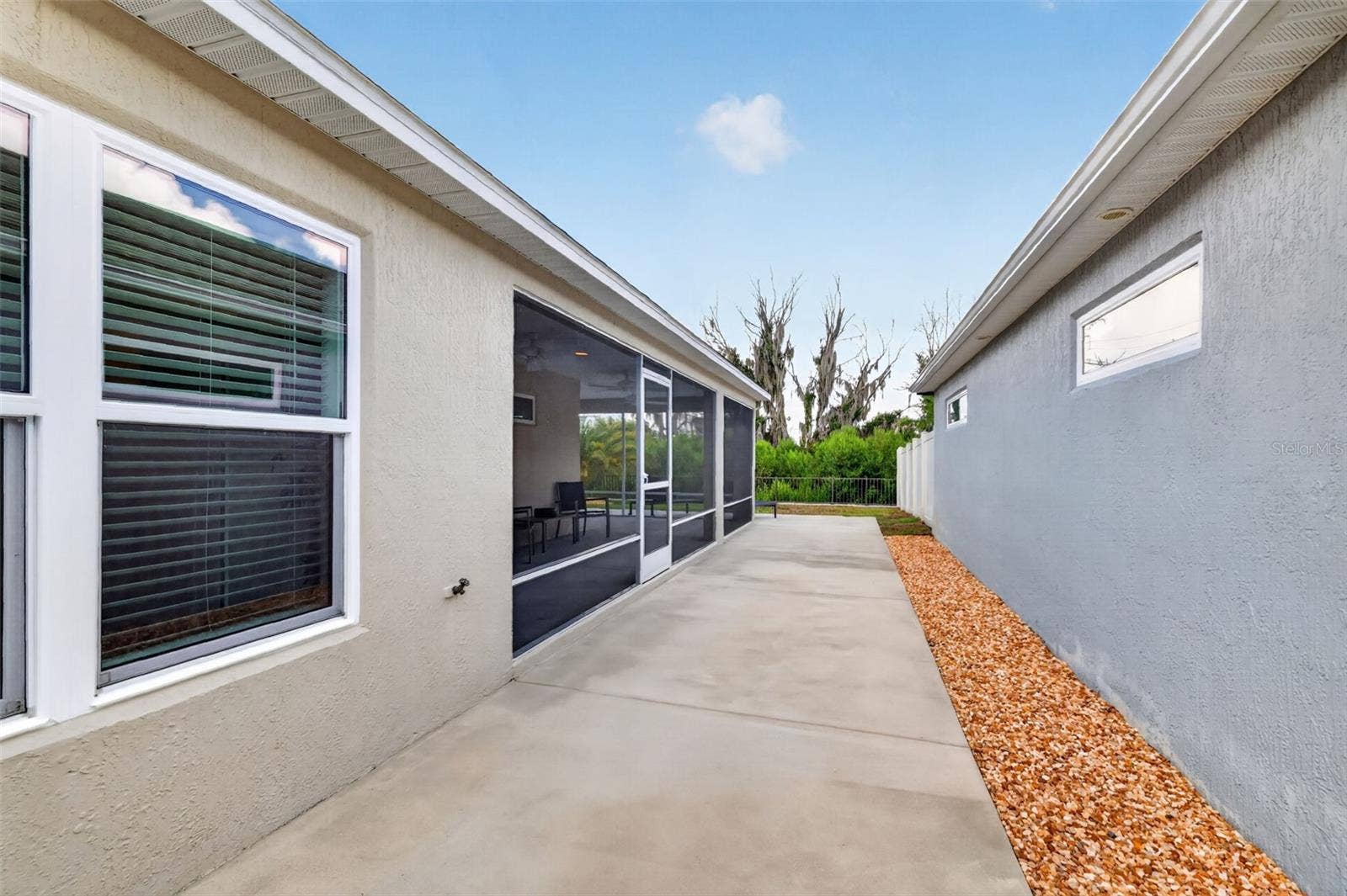 4686 HILES PLACE, The Villages, FL 32163 Side Patio