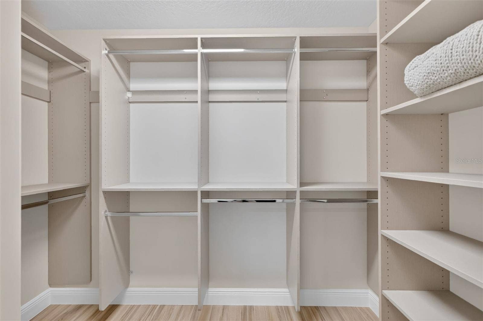 4686 HILES PLACE, The Villages, FL 32163 Primary Bedroom Customized Walk-In Closet