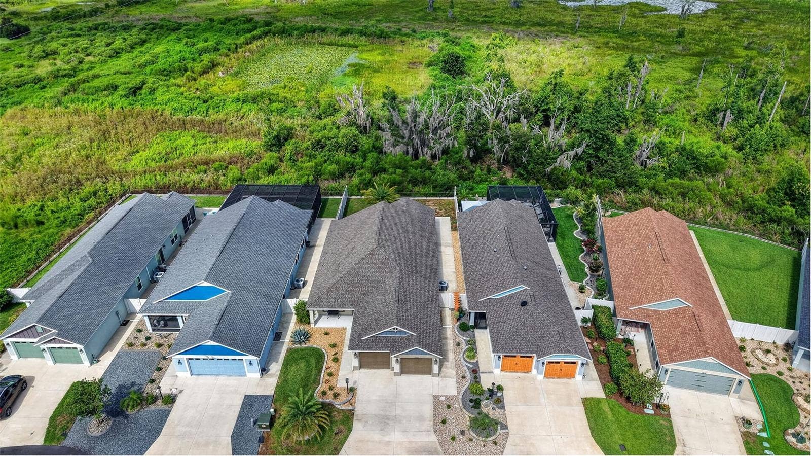 4686 HILES PLACE, The Villages, FL 32163 Front Elevation with Gorgeous Preserve and Water Views!